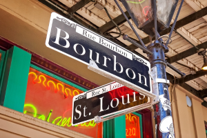 street signs that read Bourbon and St. Louise